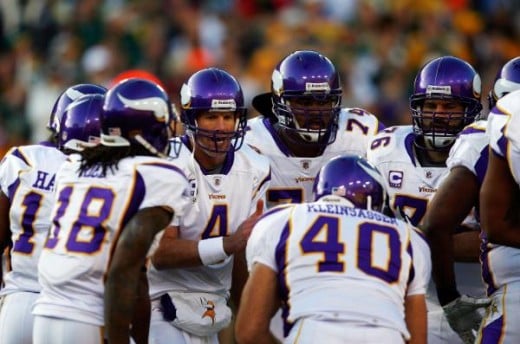 Minnesota Vikings QB Brett Favre (4) huddles with the offensive line the game between the Minnesota Vikings and Green Bay Packers on Sunday, November 1, 2009. (Ben Liebenberg/NFL.com)