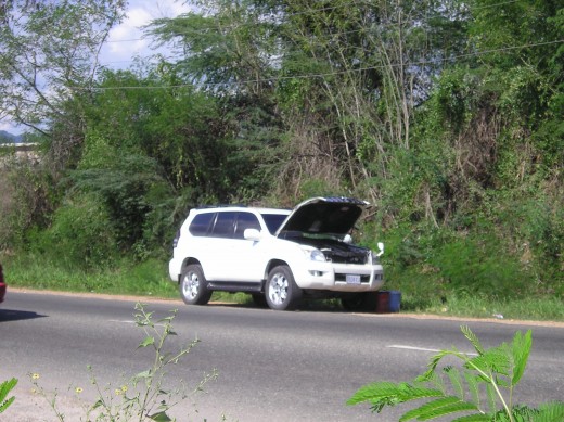 Toyota Land Cruiser stopped right here because of incorrect fuel.  Really a busy highway.  Photo by Glendon Caballero