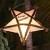 Christmas star on top of a Coconut tree Christmas star on top of a Coconut tree