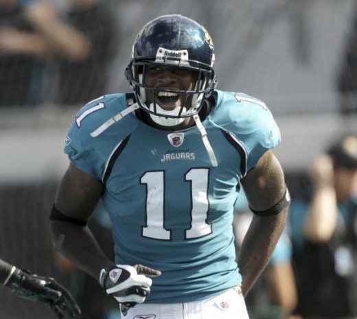 Jacksonville Jaguars wide receiver Mike Sims-Walker celebrates a second quarter touchdown during an NFL football game against the Kansas City Chiefs, Sunday, Nov. 8, 2009, in Jacksonville, Fla. (AP Photo/Phil Coale)