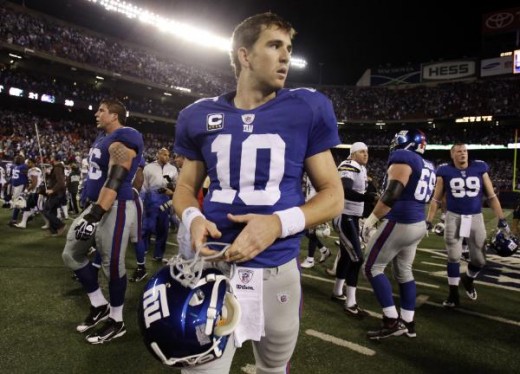 New York Giants quarterback Eli Manning (10) walks off the field after the Giants lost to the San Diego Chargers 21-20 in an NFL football game, Sunday, Nov. 8, 2009, in East Rutherford, N.J. (AP Photo/Julie Jacobson)