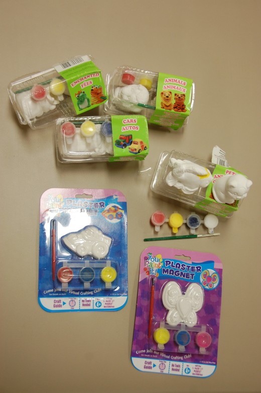 Plaster figurines and magnets.  Animals, fish, cars, butterfly.  