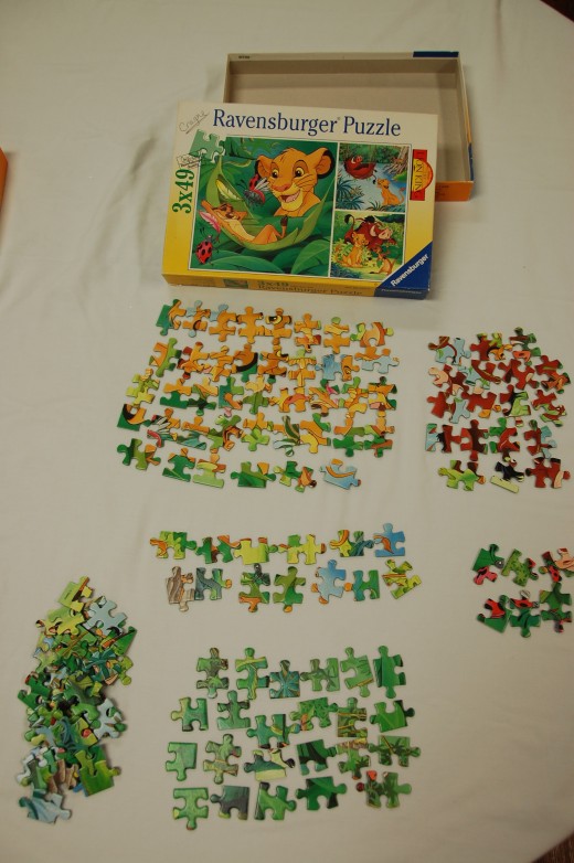 Begin sorting pieces by color, characters or other attributes.   