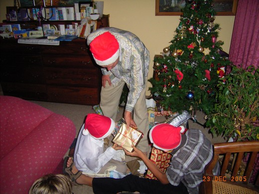 Sharing the presents under our Christmas tree that cost so little but are priceless to us.