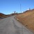 The road up the mountain is both dirt and paved. 
