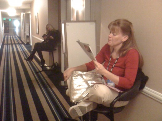 My two teammates, Jana (right) and Heidi (left) make the best of it by reading trade magazines as I did too.