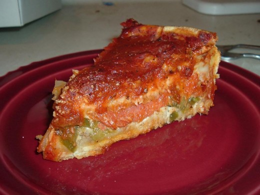 a slice of chicago style pizza