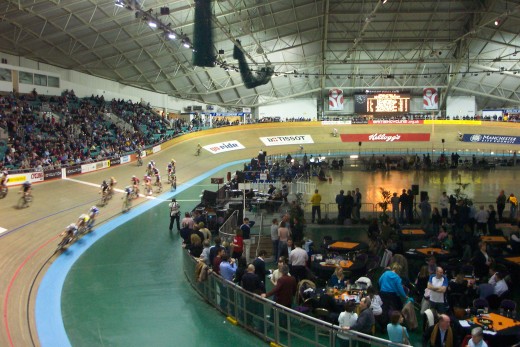 This is the Manchester Velodrome in the UK during a big international meeting. Track racing is a very specialized aspect of cycling; the bikes don't have a freewheel or brakes, so you must keep turning your pedals while moving!