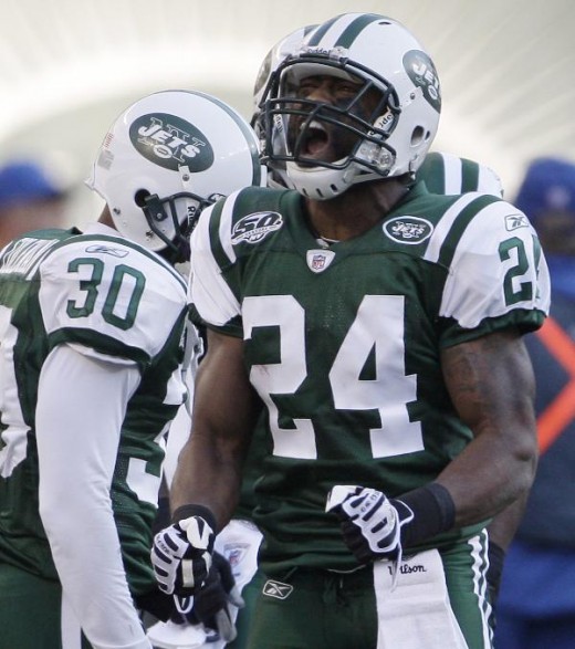 #24 Darrelle Revis reacts after intercepting a pass for the second time in the first half   (AP Photo/Julie Jacobson)