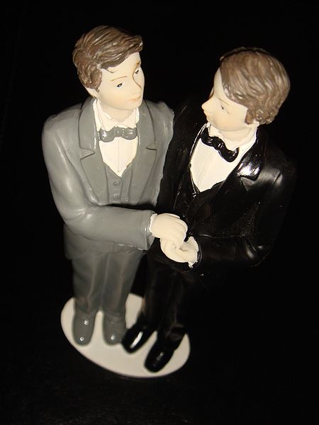Gay couple for a wedding cake.  Photo by Stefano Bolognini courtesy of Wikimedia Commons.