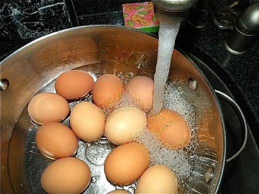 Place your eggs in a pot and run water over them to cover them. 