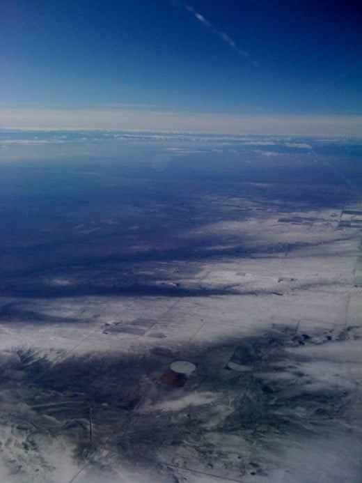 Approaching Denver and the snow appears.