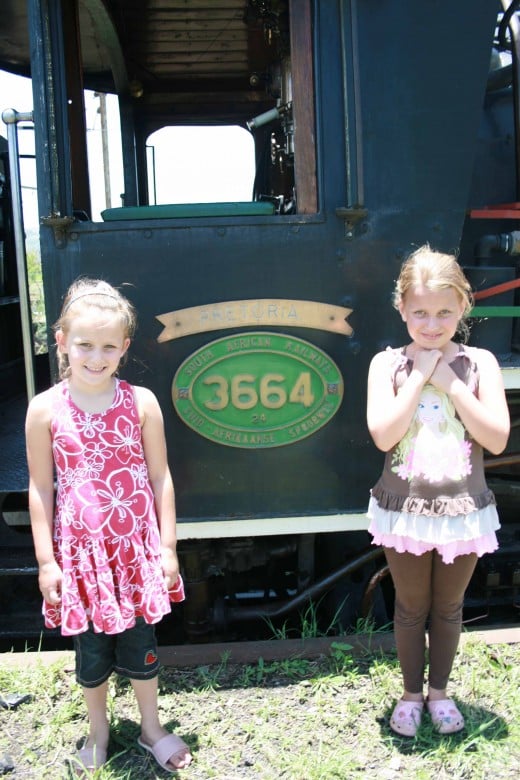 Rachael and Caitlin in front of one of the engines