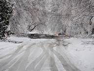 Icy roads make it difficult for power crews to make necessary repairs.