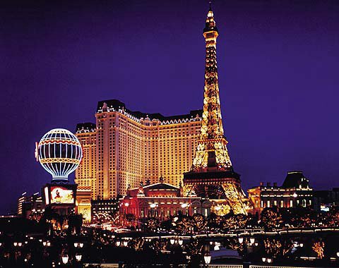 ...11 stories high in the Paris Hotel's replica of the Eiffel Tower