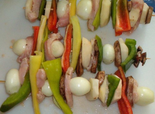 Alternate veggies chicken as shown.