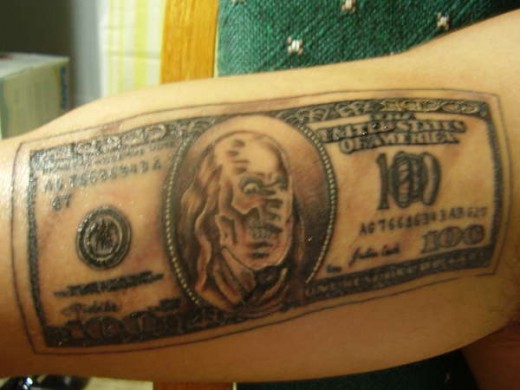 Sell Tattoos To Make Money.  Image taken from http://tattoos-and-art.com/wp-content/gallery/skull-tattoos/hundred-dollar-bill-tattoo-51752.jpg Copyright 2010.