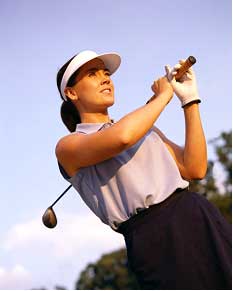 Woman Golfer Starting Her Swing