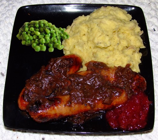 lovely sausages... creamy mash...bit of gravy...some peas...mmmmm!