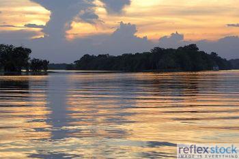 The glittering water of Amazon during sunset 