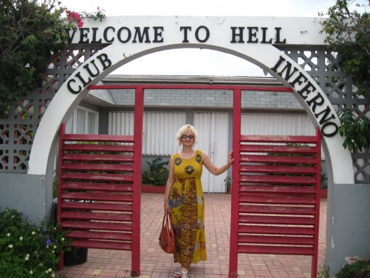 My wife at entrance to Club Inferno in town of Hell, Grand Cayman Island