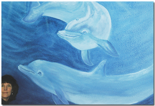 Dolphins painted on a wall at High Mesa Healing Center