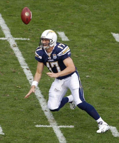 The ball goes over San Diego Chargers quarterback Philip Rivers on a botched snap in the first half of an NFL divisional playoff football game against the New York Jets, Sunday, Jan. 17, 2010, in San Diego. Rivers recovered the ball for a loss. (AP P