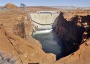 Spanning the distance of the canyon walls, is the Glen Canyon Dam.