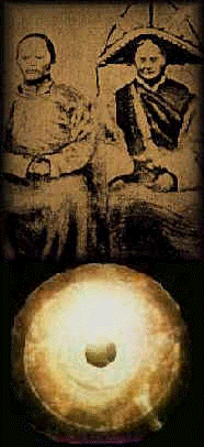 This photo, taken by Dr. Karly Robin-Evans during his 1947 expedition shows the Dropa stone and the present clan of Dropa And Han.   