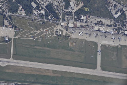 Military and civilian aircraft on the flight line at Toussaint Louverture International Airport in Port-au-Prince, Haiti, Jan. 16, 2010. The airport accepted foreign personnel in relief efforts. 