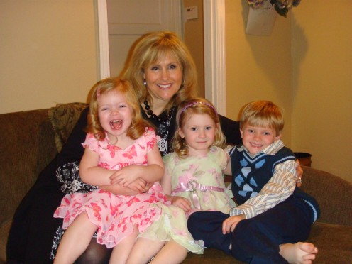 Three little angels sitting on Nana's lap!