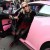 Pink Bentley with Paris Hilton Exiting the Automobile