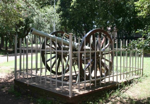 Reflecting Smuts's military career, this field cannon stands in the fron garden of the Doornkloof homestead