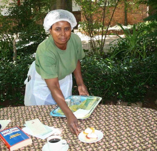 There is a lovely tea garden under the trees to the side of the house. This is Jostina serving me my cream scones. They were delicious!