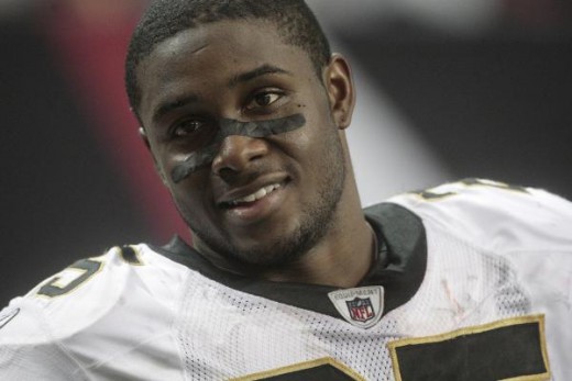 New Orleans Saints running back Reggie Bush is pictured near the end of a 26-23 win over the Atlanta Falcons during an NFL football game in Atlanta Sunday, Dec. 13, 2009. (AP Photo/Dave Martin)