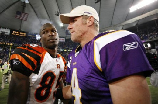 Minnesota Vikings' Brett Favre (4) talks with Cincinnati Bengals' Chad Ochocinco (85) after the second half of an NFL football game Sunday, Dec. 13, 2009, in Minneapolis. The Vikings won 30-10. (AP Photo/Andy King)