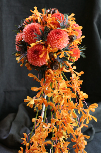 Warm rich colors are traditional for autumn wedding flowers.