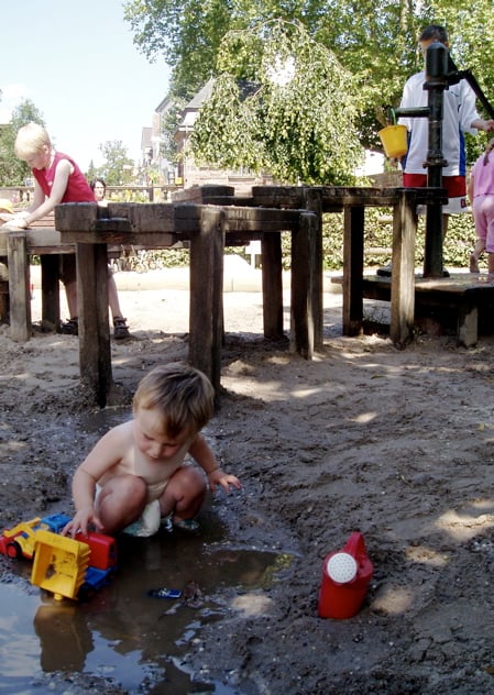 Kid always love to play water and sand