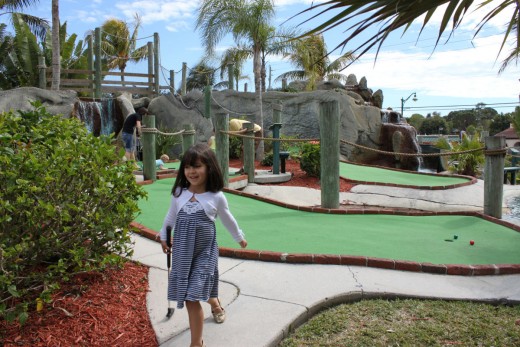 My daughter, very proud of herself (the red ball is hers).