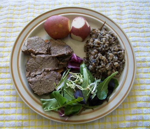 Aromatic nutty grains make for a nutritious and filling side along the tender roast.  Sure, you can have the greens on another plate!  