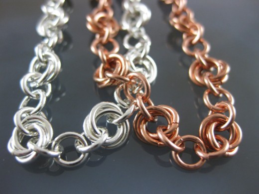 Delicate flower style chainmail bracelets in silver and copper
