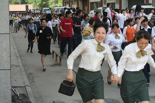 People evacuating after an earthquake.
