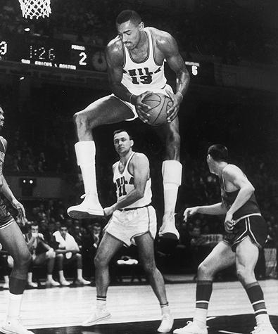 Wilt goes up for a rebound