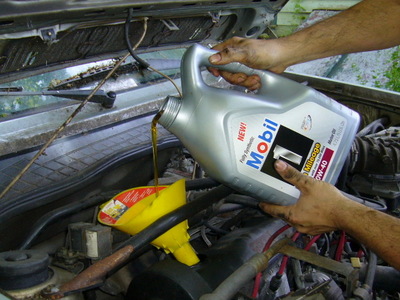 Fill Engine with New Oil (autorepair.about)