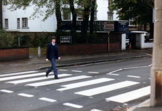 paul stopping the traffic as he strides over the famous Abbey road crossing! In the background you can see the Royal philharmonic orchestra's lorry. They were busy recording the first of their 'Hooked on classics' albums