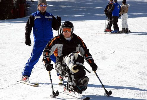 Sgt. Anthony Larson with his adaptive ski instructor at Vail, Colorado in 2007. Sgt. Larson lost his right leg below the knee while serving in Iraq. 