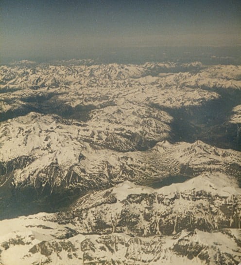The Alps from above. Craggy and White. Copyright Tricia Mason 1980