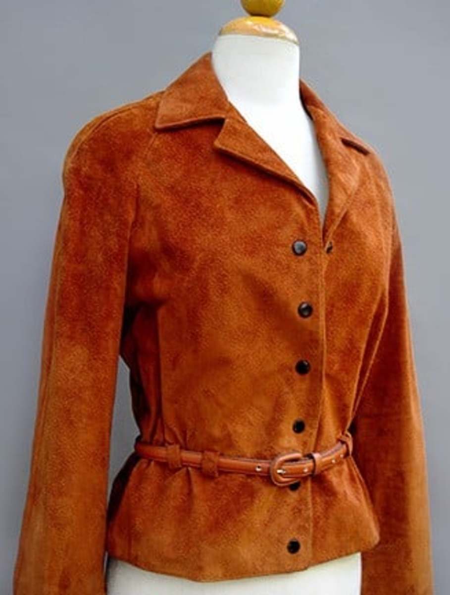 Vintage brushed sued jacket in burnt orange colour with leather belt. 1970s from Neiman Marcus by Anne Klein.
