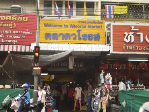 The busy Warorot Market, filled with stalls selling food, snacks and clothes.