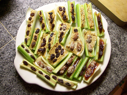 Celery with cashew butter and raisins